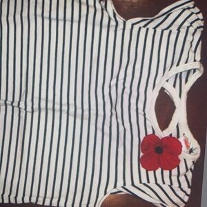 Showcase a classic striped shirt pattern sleeve neck top